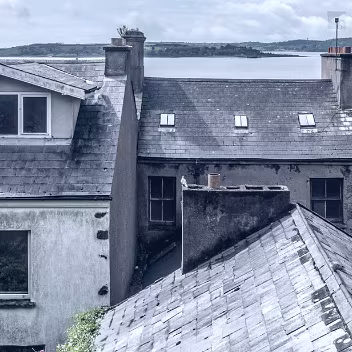 ROOFTOPS OF COBH Cobh's unique topography and the age of its buildings contribute significantly to the difficulties of maintaining its...