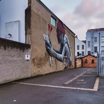 THE SON OF PROTAGORAS MTO is a renowned street artist known for his politically charged murals in cities around the world. His true identity...