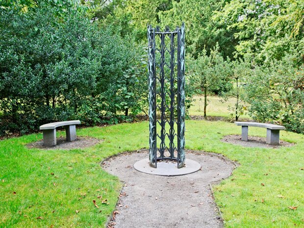MISSING PERSONS The "Monument To Missing Persons" is a deeply moving sculpture that captures the profound sense of loss and longing...