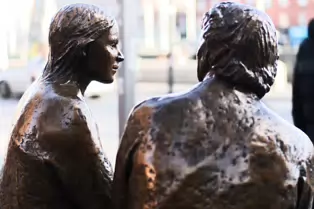 THE MEETING PLACE IS A SCULPTURE BY JACKIE McKENNA [LOCALLY KNOWN AS THE HAGS WITH THE BAGS]-248553-1