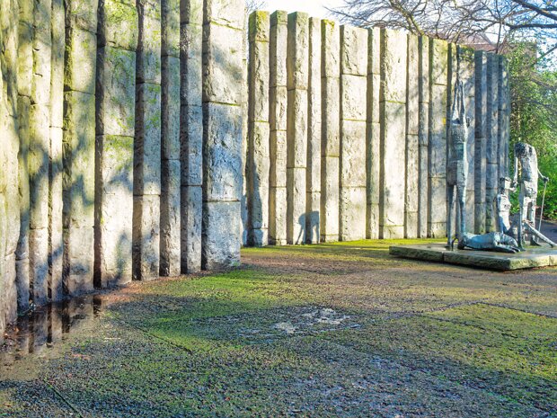 FAMINE MEMORIAL Erected in 1967, Edward Delaney's 'Famine' memorial, located in St. Stephen's Green, Dublin, is a freestanding...