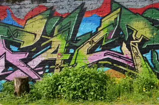 A LINEAR GALLERY OF STREET ART [ON FERRY WALK LEADING TO THE SHAKEY BRIDGE]-247697-1