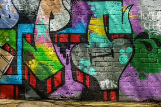 A LINEAR GALLERY OF STREET ART [ON FERRY WALK LEADING TO THE SHAKEY BRIDGE]-247709-1