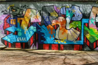 A LINEAR GALLERY OF STREET ART [ON FERRY WALK LEADING TO THE SHAKEY BRIDGE]-247710-1