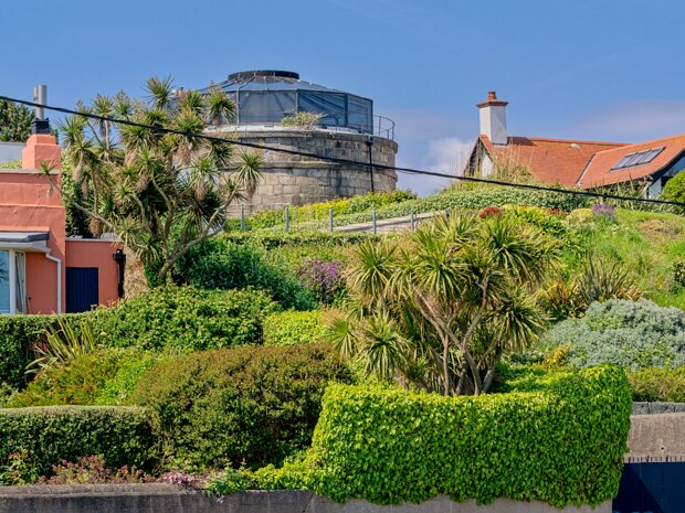 MARTELLO TOWER IN BRAY Martello Towers stand as distinctive relics of the early 19th century, small but formidable defensive structures erected...