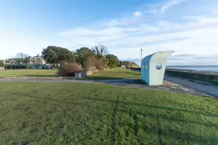 THE WIND SHELTERS AND THE BANDSTAND ALONG CLONTARF PROMENADE [REMAIN AS A TRIBUTE TO HERBERT SIMMS]-246841-1