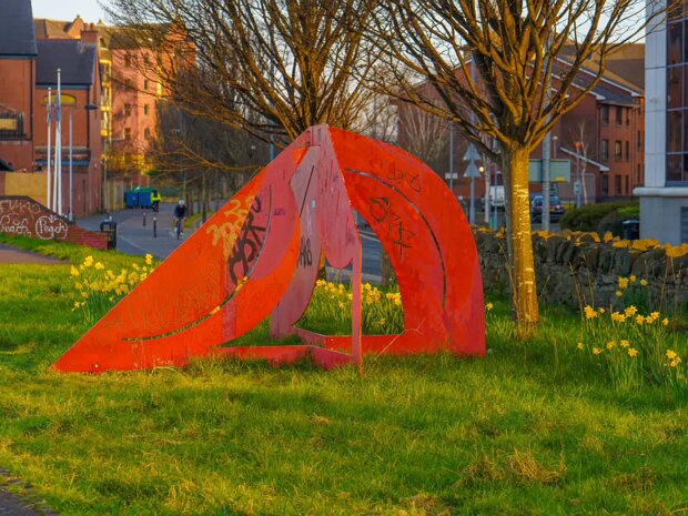 RED METAL SCULPTURE Based on these sources, it is safe to say that the sculpture is indeed called "Greenland 1983" and was created by Bob...