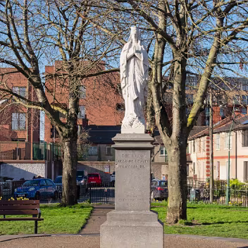 MARIAN STATUE AT OSCAR SQUARE The small urban green space, now commonly known as Oscar Square Park, has a history that intertwines mythology, wartime...