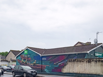 THE FISHERMEN OR PADY POWER MURAL The large mural on the wall of the Paddy Power building in Thomondgate, which depicts Limerick fishermen in their...