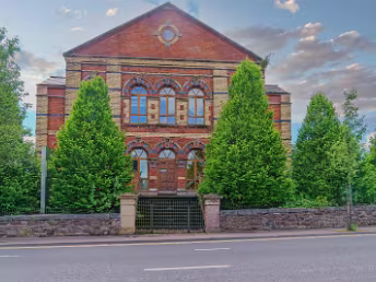 WAS MCCLURE DEPARTMENT STORE This attractive building at the junction of McClure Street and Ormeau Road, formerly known as McClure's Department...