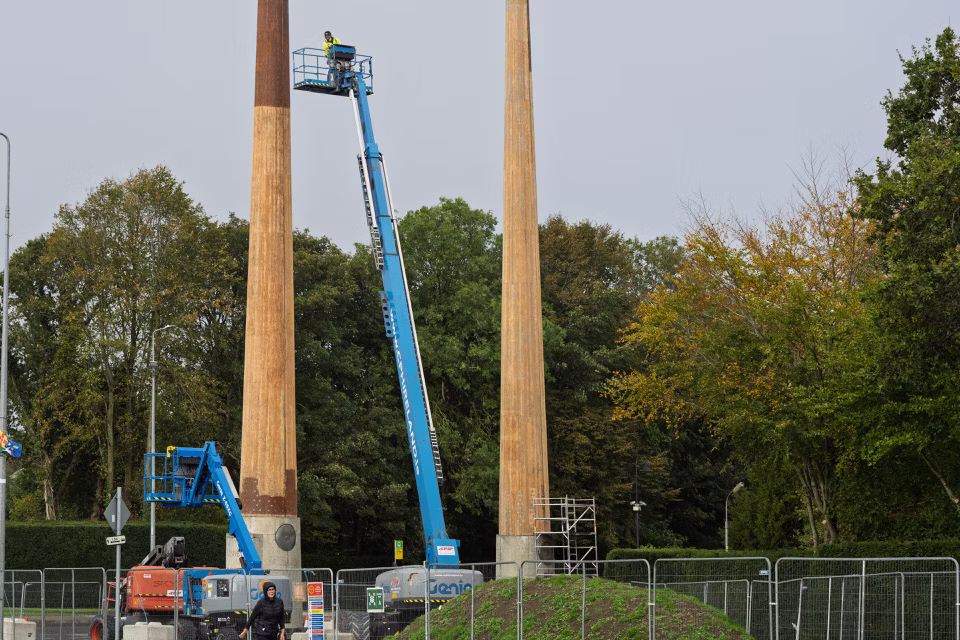 The Flagpoles And The Wall Of Light At The Entrance To The Limerick University Campus